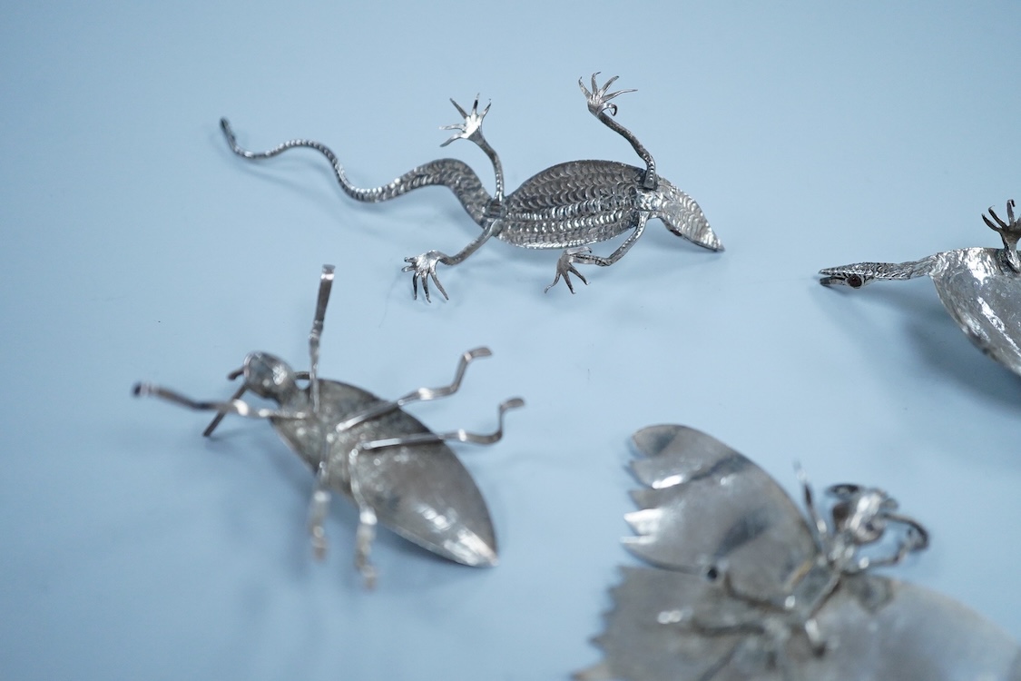 Six Thai or Malaysian white metal models of creatures, to include a Praying Mantis, height 45mm, a tortoise, a dragonfly, a butterfly, a lizard and a beetle.